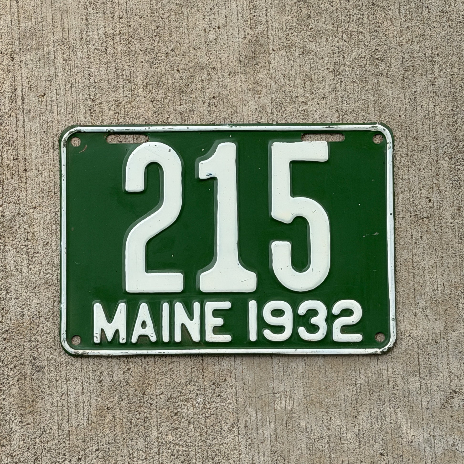 Photo of a 1932 Maine License Plate Auto Tag Garage Decor Vintage Low Number Three Digit 215 with original patina