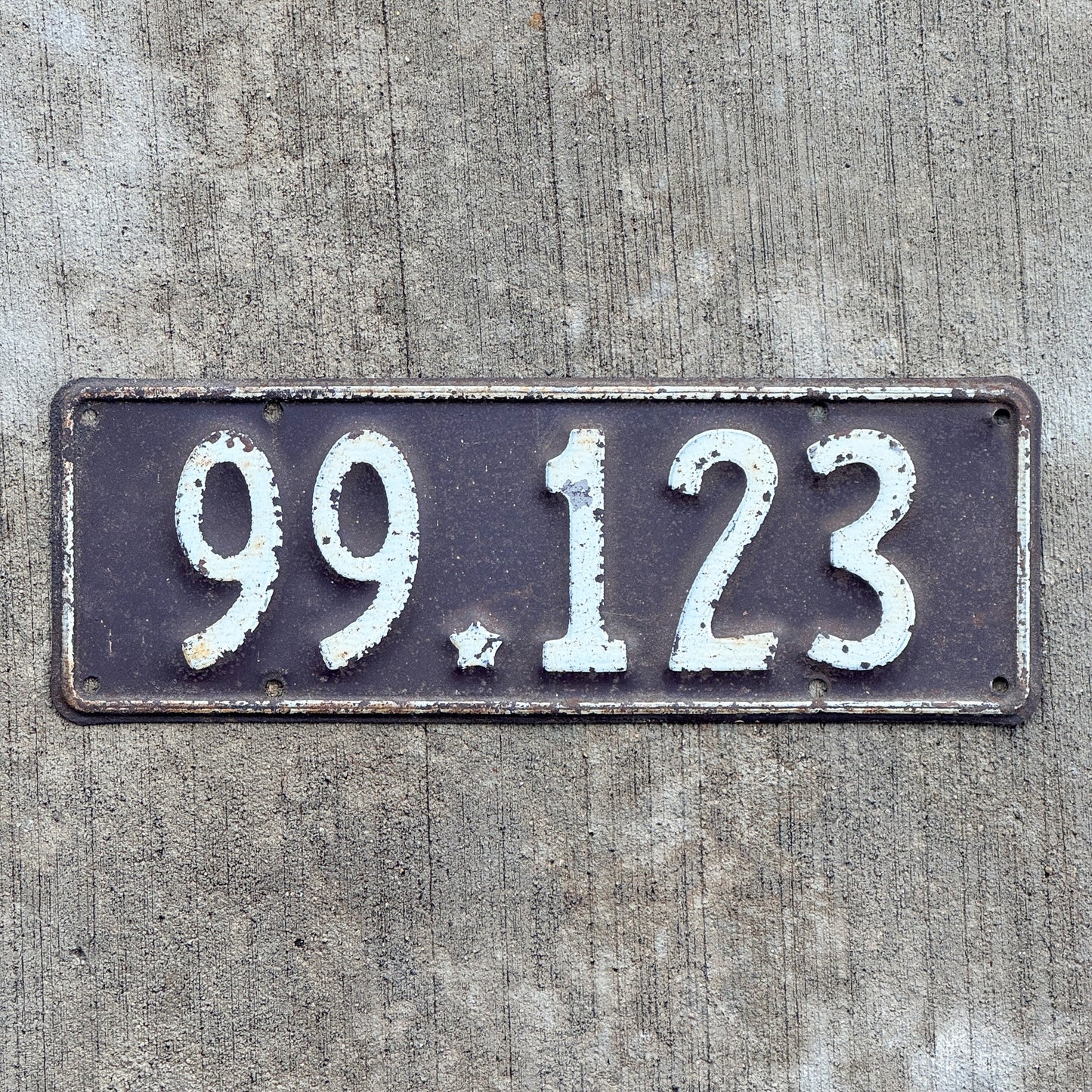 Photo of a 1933 1934 New Zealand License Plate Auto Tag Garage Decor Vintage 99 123 with original patina