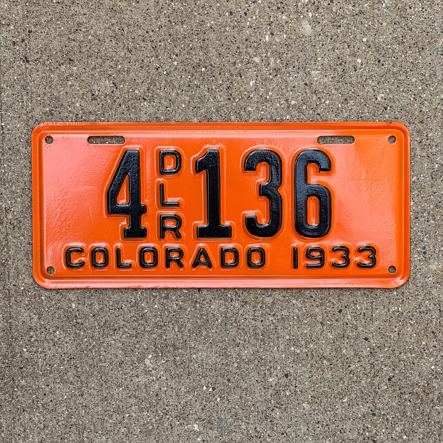 Photo of a 1933 Colorado Dealer License Plate Auto Tag Garage Decor Vintage 4 136 with original patina