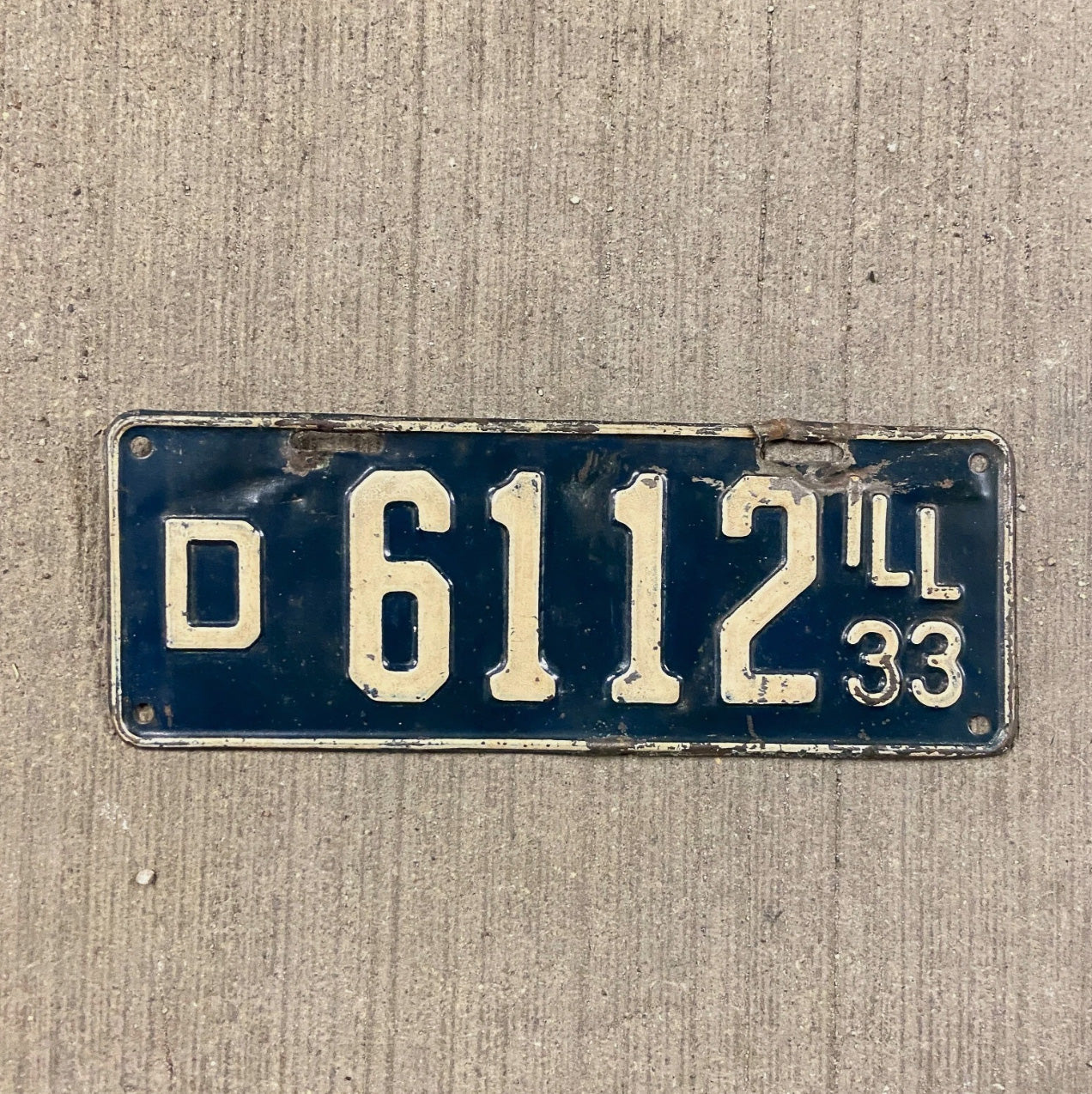Photo of a 1933 Illinois Truck License Plate Auto Tag Garage Decor Vintage D 6112 with original patina