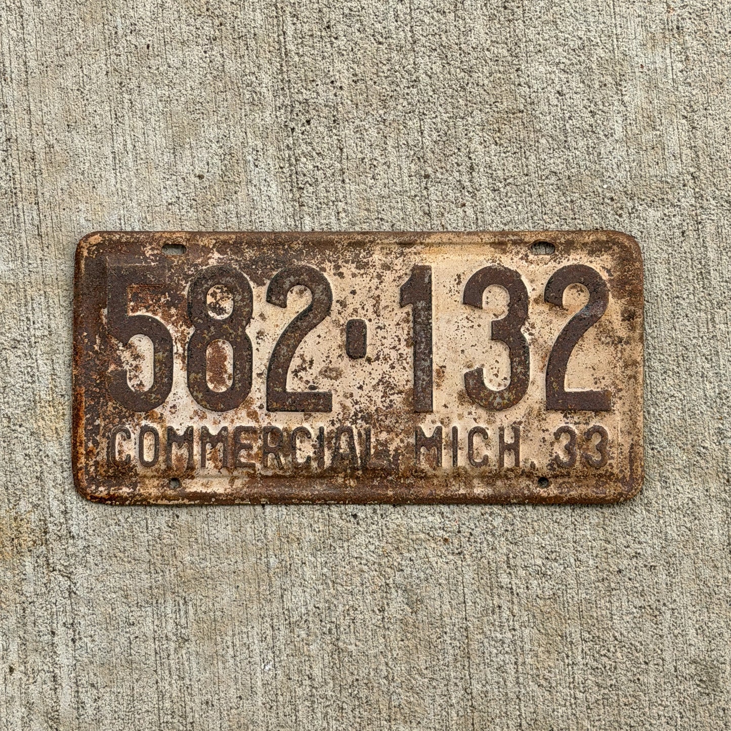 Photo of a 1933 Michigan Commercial License Plate Auto Tag Garage Decor Vintage 582 132 with original patina