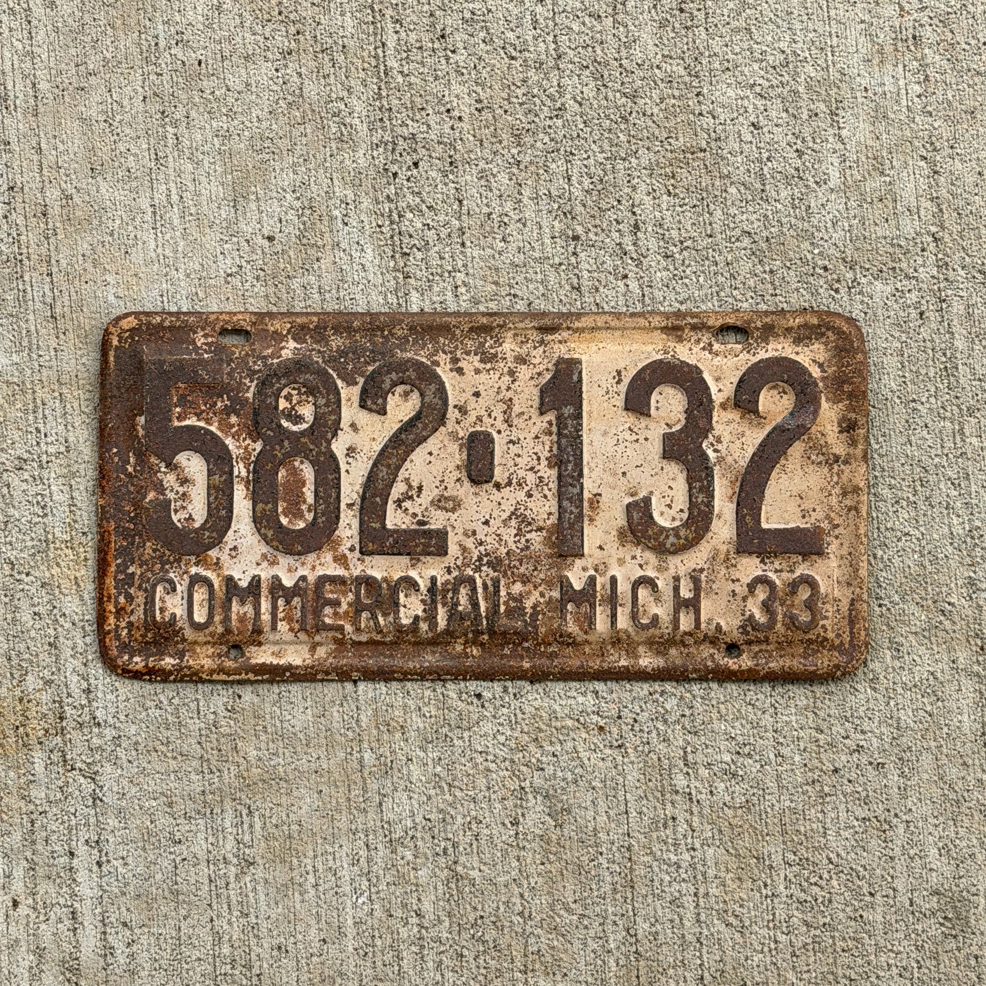Photo of a 1933 Michigan Commercial License Plate Auto Tag Garage Decor Vintage 582 132 with original patina