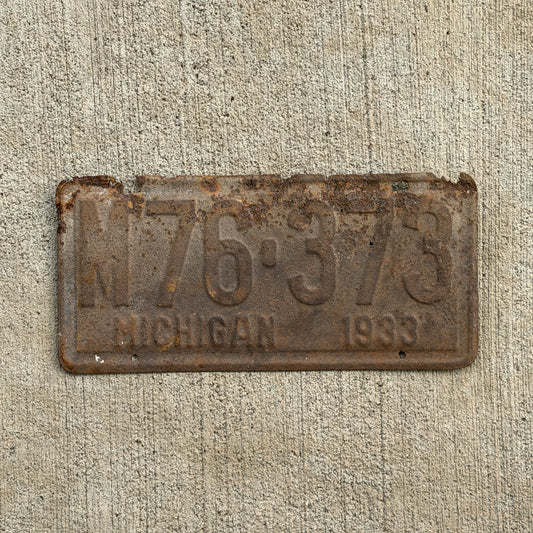 Photo of a 1933 Michigan License Plate Auto Tag Garage Decor Vintage M76 373 with original patina