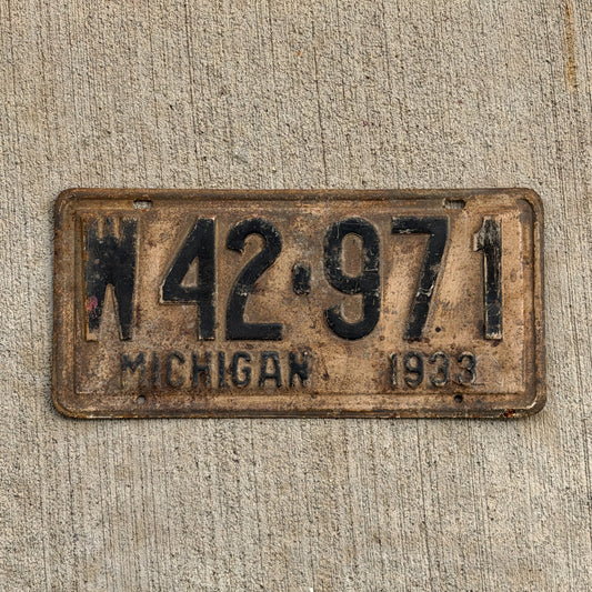Photo of a 1933 Michigan License Plate Auto Tag Garage Decor Vintage W42 971 with original patina