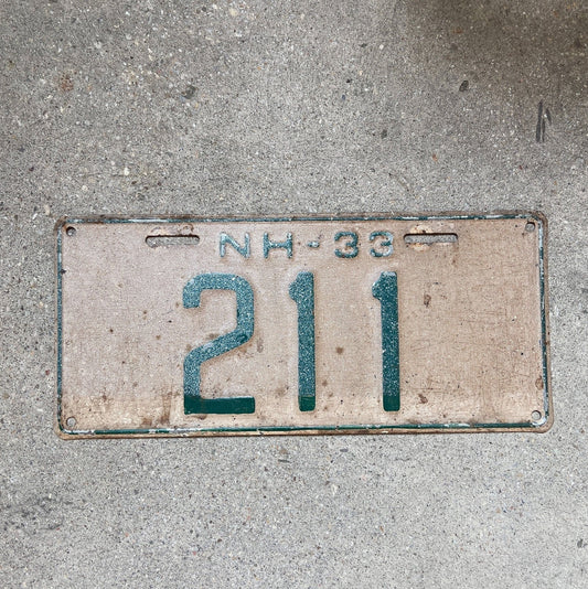 Photo of a 1933 New Hampshire License Plate Auto Tag Garage Decor Vintage Low Number Three Digit 211 with original patina