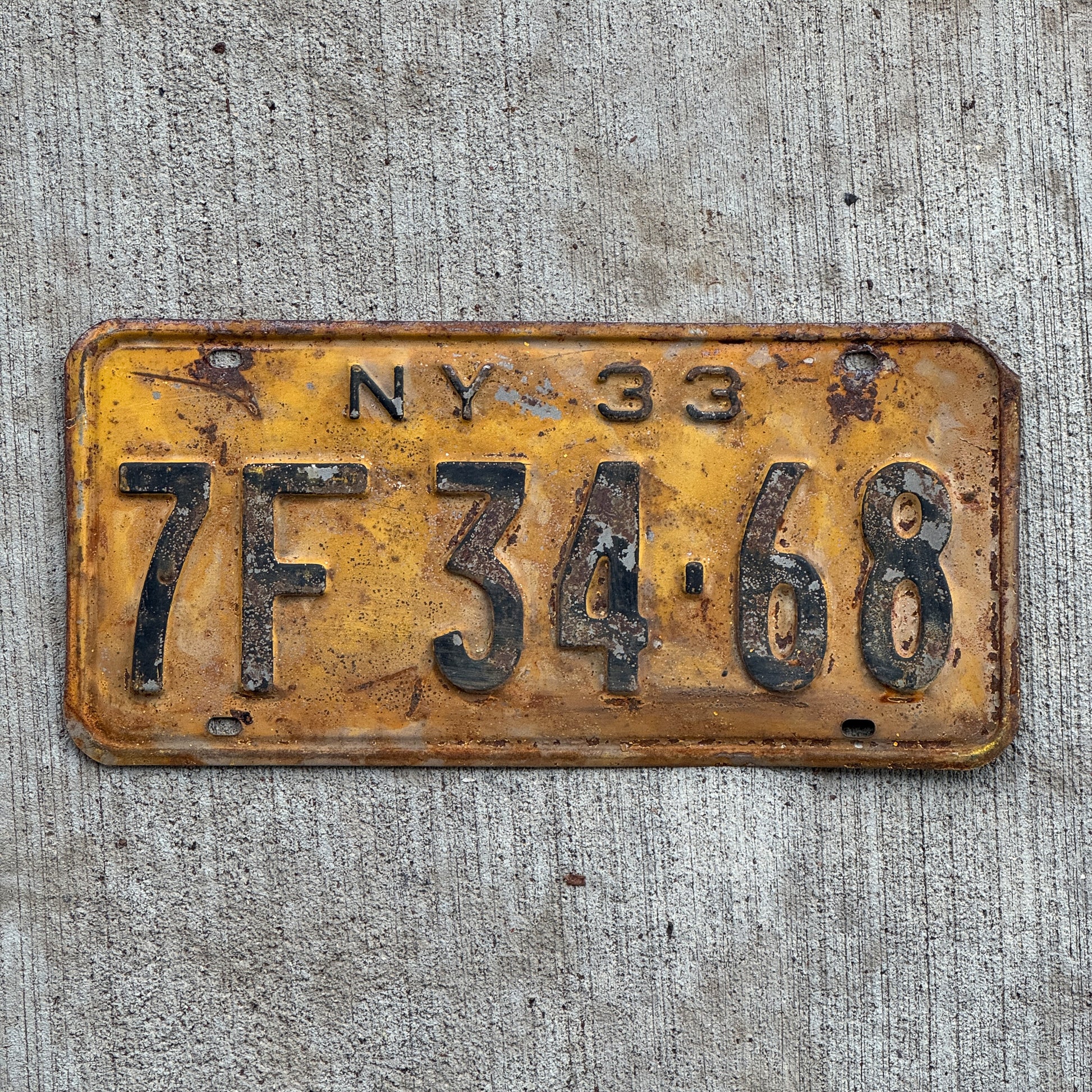 Photo of a 1933 New York License Plate Auto Tag Garage Decor Vintage 7F 34 68 with original patina