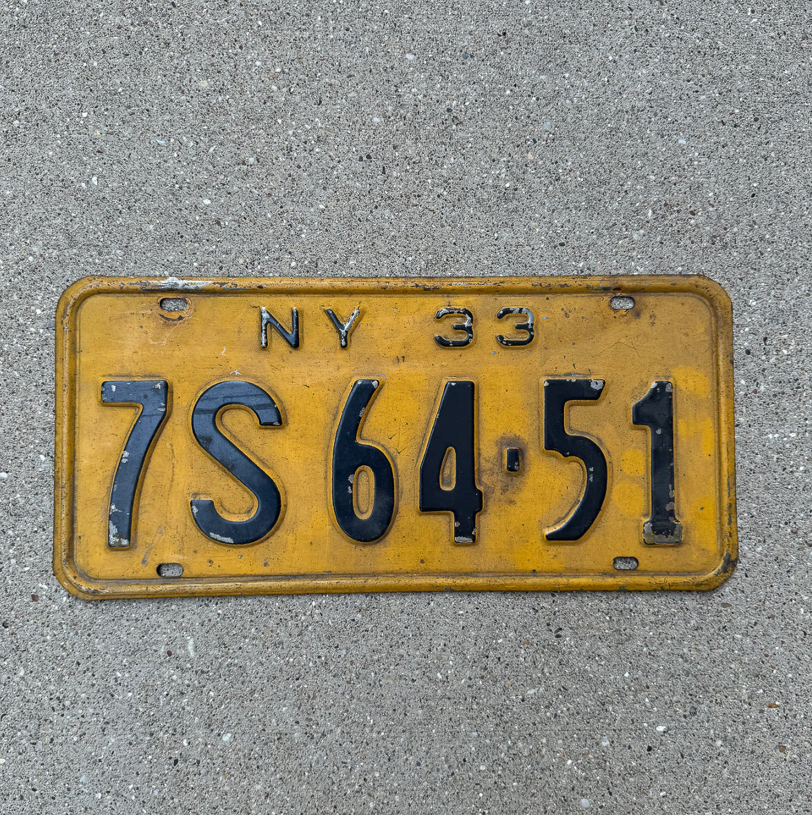 Photo of a 1933 New York License Plate Auto Tag Garage Decor Vintage 7S 64 51 with original patina