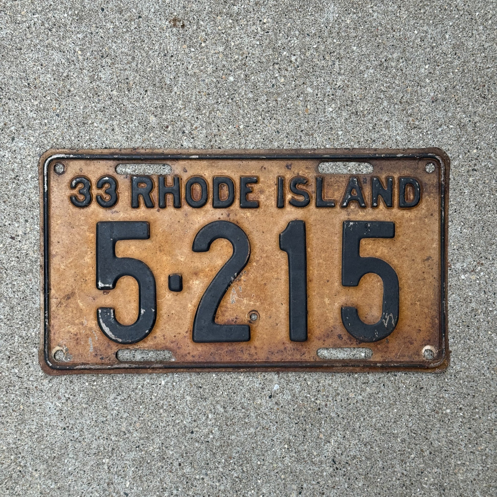 Photo of a 1933 Rhode Island License Plate Auto Tag Garage Decor Vintage Low Number Four Digit 5215 with original patina