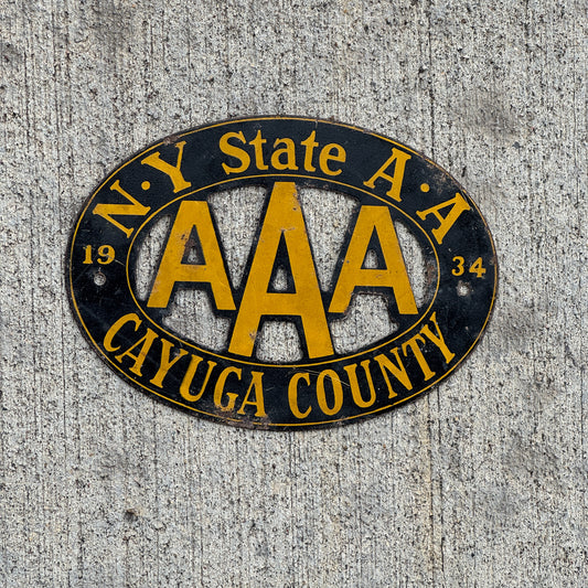 Photo of a 1934 Cayuga New York Badge Emblem License Plate Topper Auto Tag Garage Decor Vintage AAA with original patina