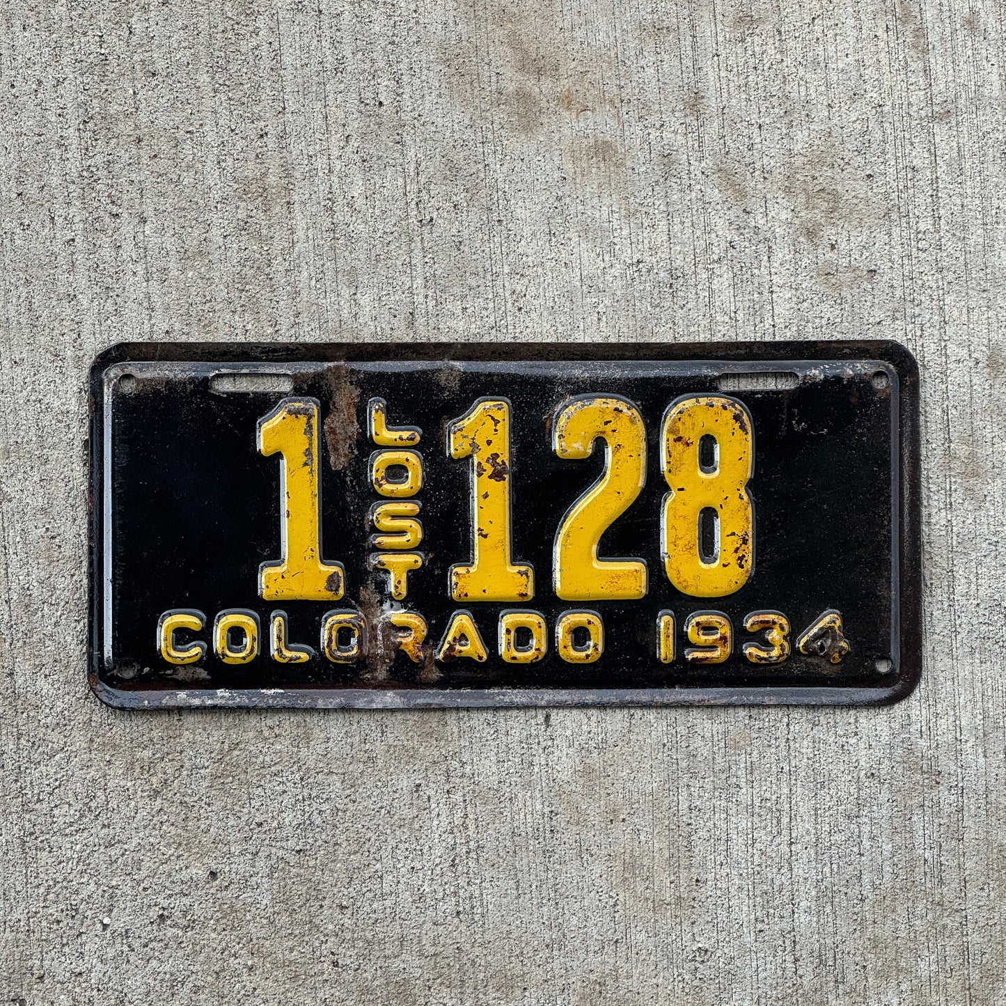 Photo of a 1934 Colorado Replacement License Plate Auto Tag Garage Decor Vintage Lost 1 128 with original patina