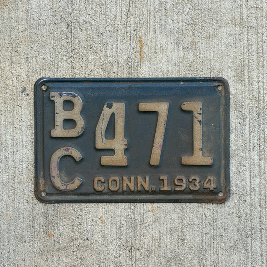 Photo of a 1934 Connecticut License Plate Auto Tag Garage Decor Vintage BX 471 with original patina
