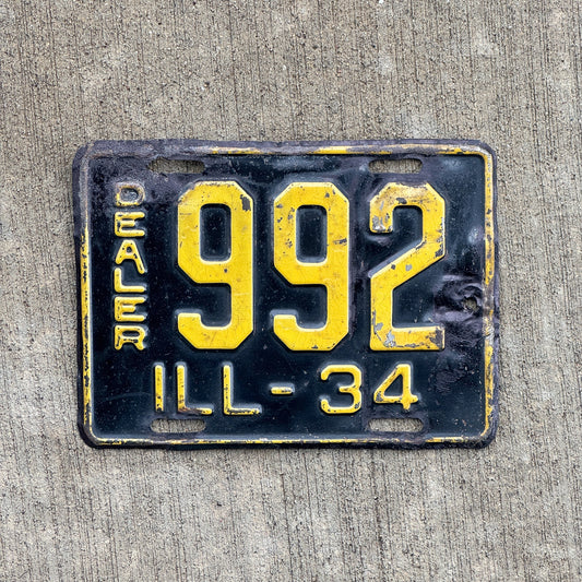 Photo of a 1934 Illinois Dealer License Plate Auto Tag Garage Decor Vintage Low Number Three Digit 992 with original patina