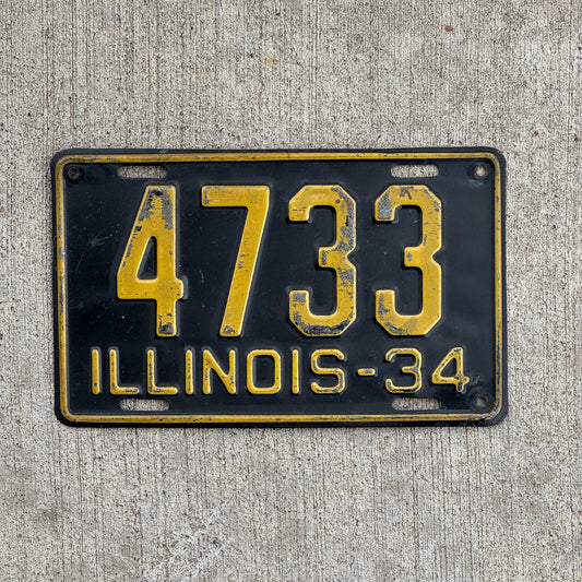 Photo of a 1934 Illinois License Plate Auto Tag Garage Decor Vintage Low Number Four Digit 4733 with original patina