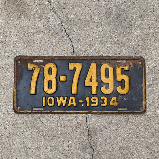 Photo of a 1934 Iowa License Plate Auto Tag Garage Decor Vintage 78 7495 with original patina