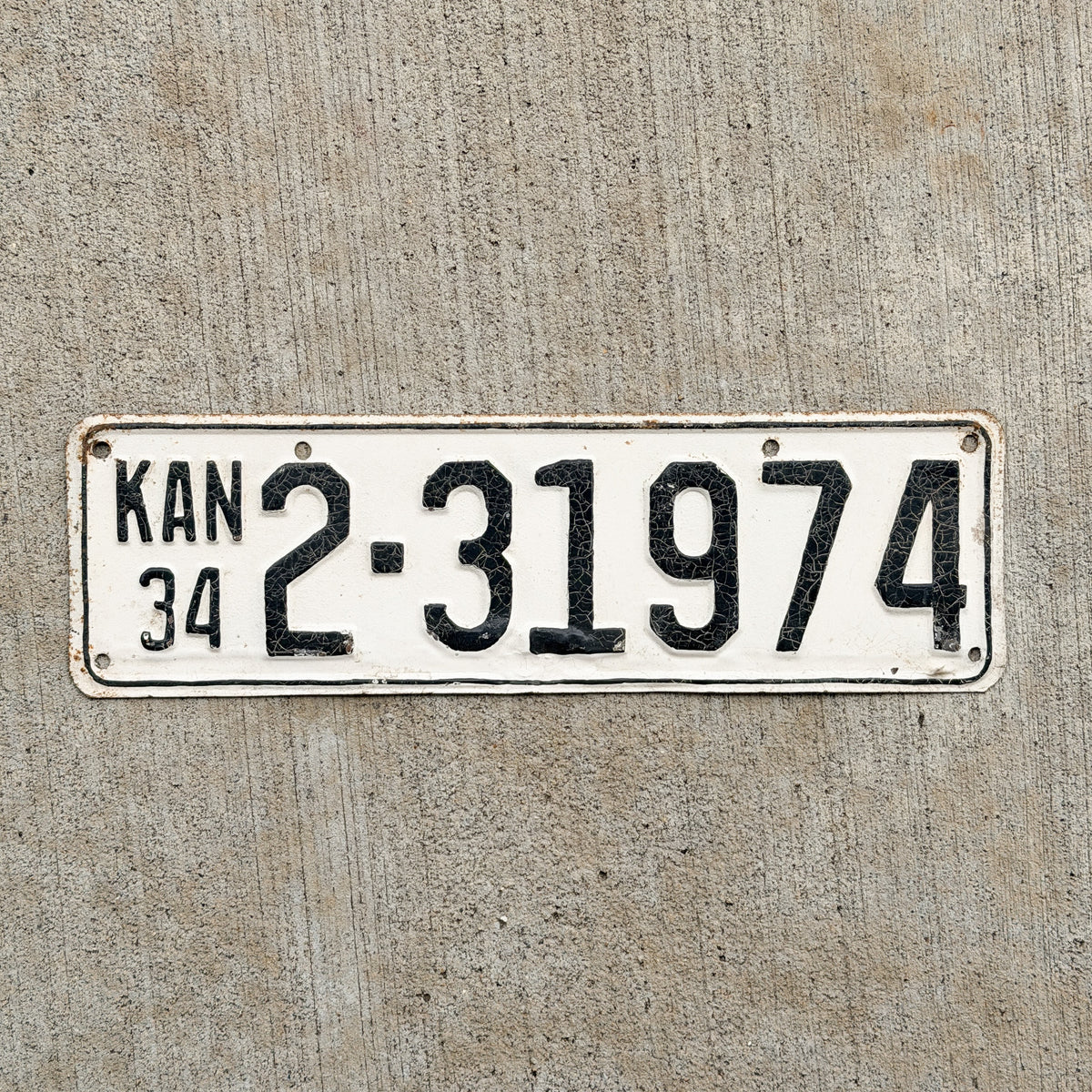Photo of a 1934 Kansas License Plate Auto Tag Garage Decor Vintage 2 31974 with original patina