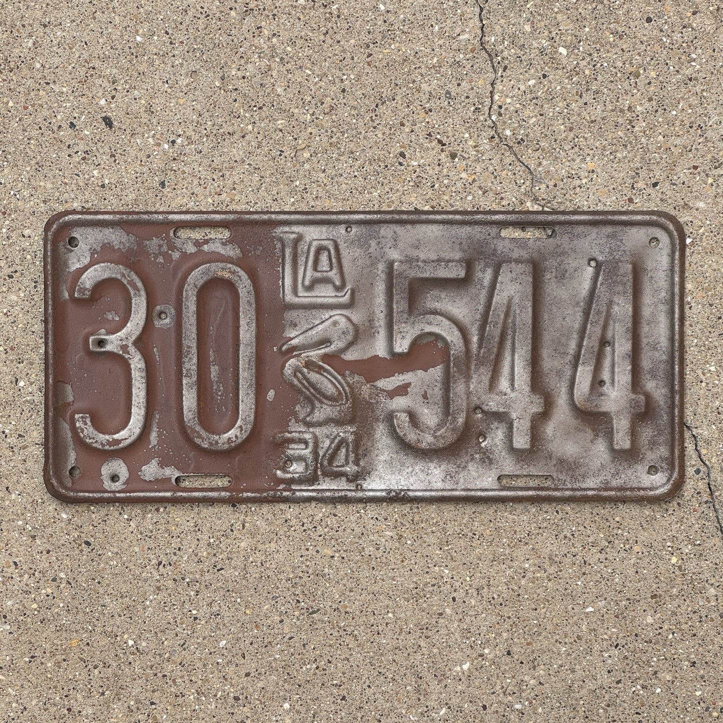 Photo of a 1934 Louisiana License Plate Auto Tag Garage Decor Vintage Iconic Pelican 30 544 with original patina
