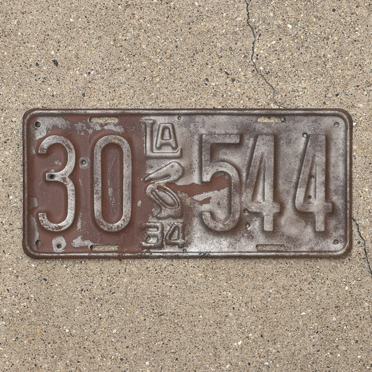 Photo of a 1934 Louisiana License Plate Auto Tag Garage Decor Vintage Iconic Pelican 30 544 with original patina