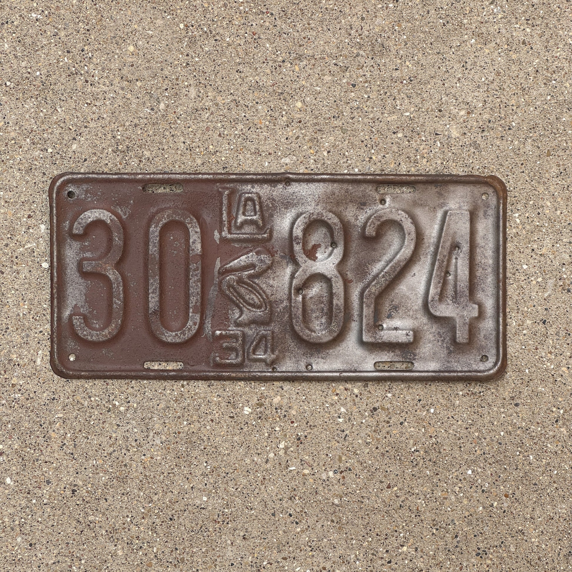 Photo of a 1934 Louisiana License Plate Auto Tag Garage Decor Vintage Iconic Pelican 30 824 with original patina