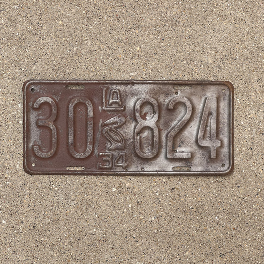 Photo of a 1934 Louisiana License Plate Auto Tag Garage Decor Vintage Iconic Pelican 30 824 with original patina