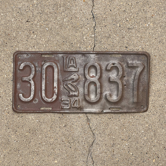 Photo of a 1934 Louisiana License Plate Auto Tag Garage Decor Vintage Iconic Pelican 30 837 with original patina