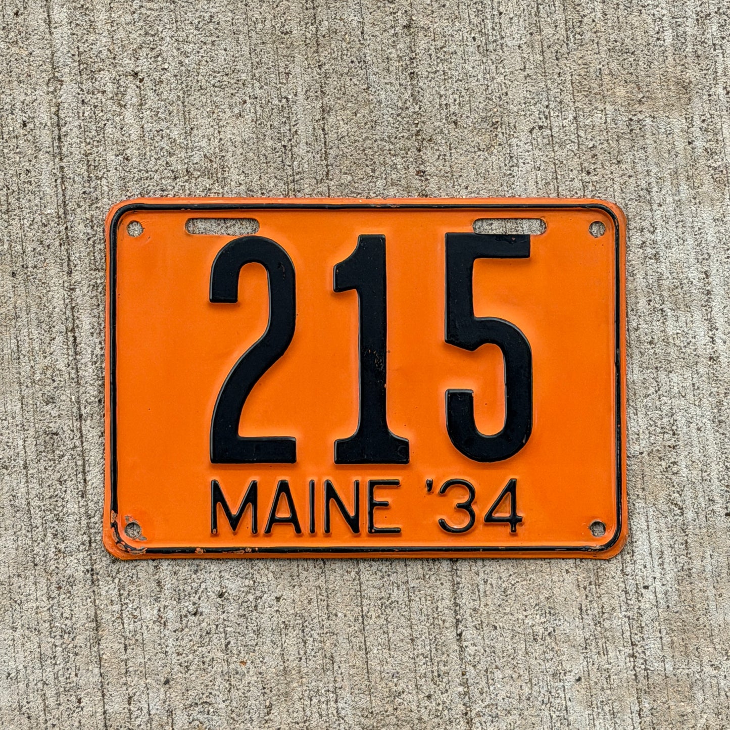 Photo of a 1934 Maine License Plate Auto Tag Garage Decor Vintage Low Number Three Digit 215 with original patina