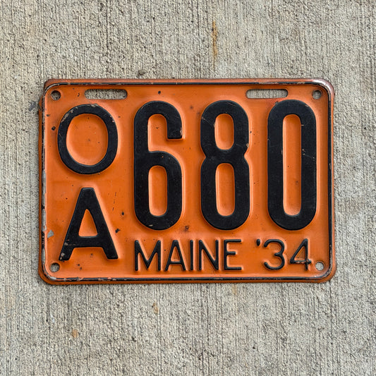 Photo of a 1934 Maine Station Wagon License Plate Auto Tag Garage Decor Vintage OA 680 with original patina