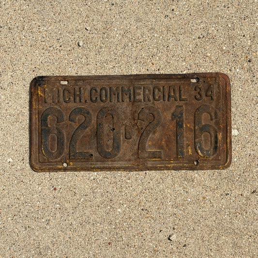 Photo of a 1934 Michigan Commercial License Plate Auto Tag Garage Decor Vintage 620 216 with original patina