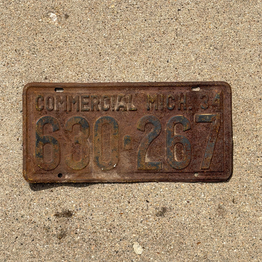 Photo of a 1934 Michigan Commercial License Plate Auto Tag Garage Decor Vintage 630 267 with original patina