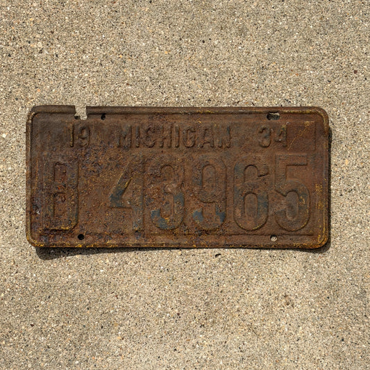 Photo of a 1934 Michigan License Plate Auto Tag Garage Decor Vintage 8 43965 with original patina