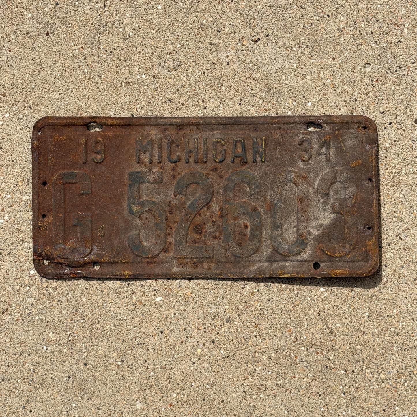 Photo of a 1934 Michigan License Plate Auto Tag Garage Decor Vintage G 52603 with original patina