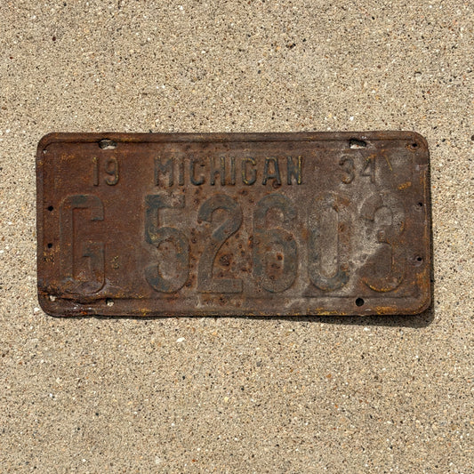 Photo of a 1934 Michigan License Plate Auto Tag Garage Decor Vintage G 52603 with original patina