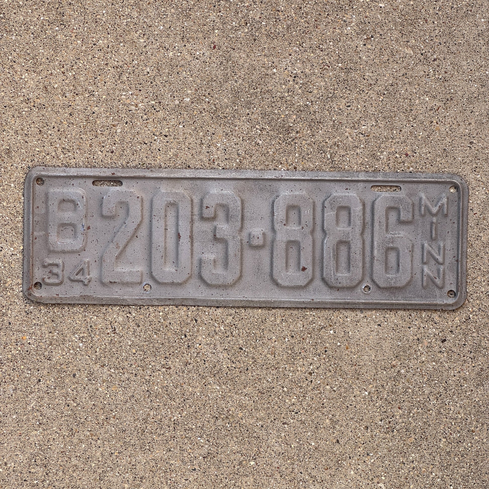 Photo of a 1934 Minnesota License Plate Auto Tag Garage Decor Vintage B 203 886