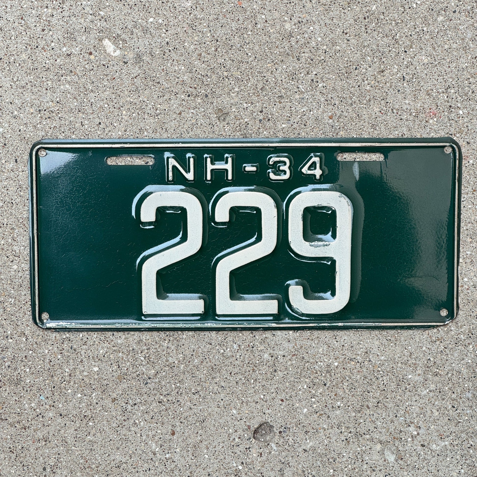 Photo of a 1934 New Hampshire License Plate Auto Tag Garage Decor Vintage Low Number Three Digit 229 with original patina