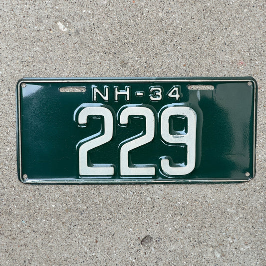 Photo of a 1934 New Hampshire License Plate Auto Tag Garage Decor Vintage Low Number Three Digit 229 with original patina