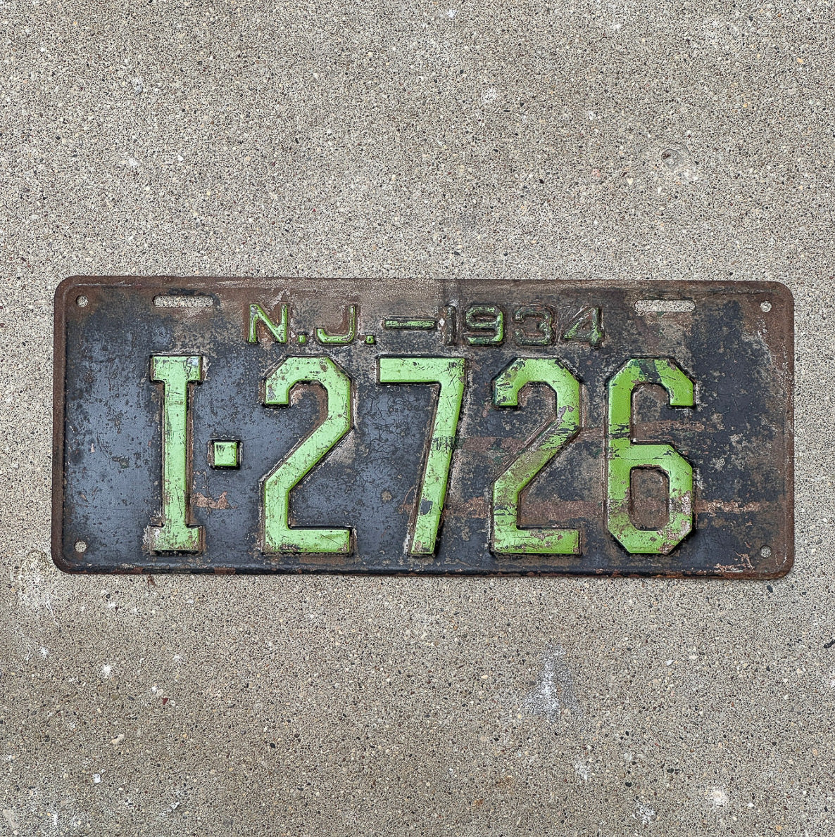 Photo of a 1934 New Jersey License Plate Auto Tag Garage Decor Vintage I 2726 with original patina