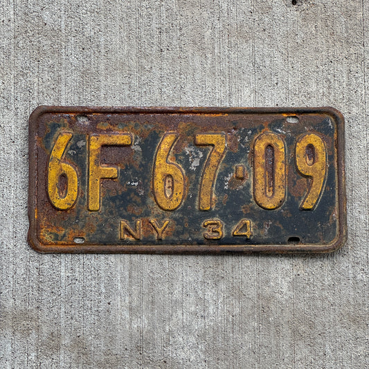 Photo of a 1934 New York License Plate Auto Tag Garage Decor Vintage 6F 67 09 with original patina