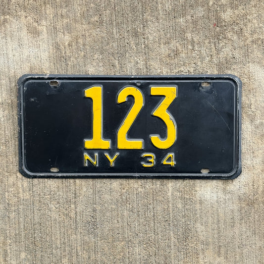 Photo of a 1934 New York Reserved License Plate Auto Tag Garage Decor Vintage ALPCA Archive Example Low Number Three Digit 123 with original patina