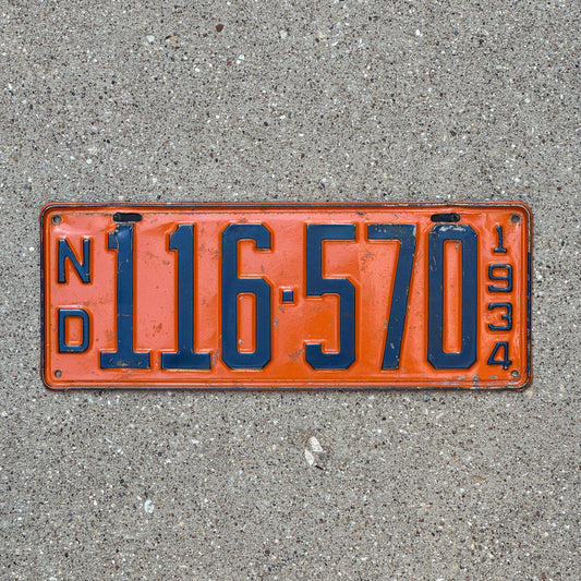 Photo of a 1934 North Dakota License Plate Auto Tag Garage Decor Vintage 116 570 with original patina