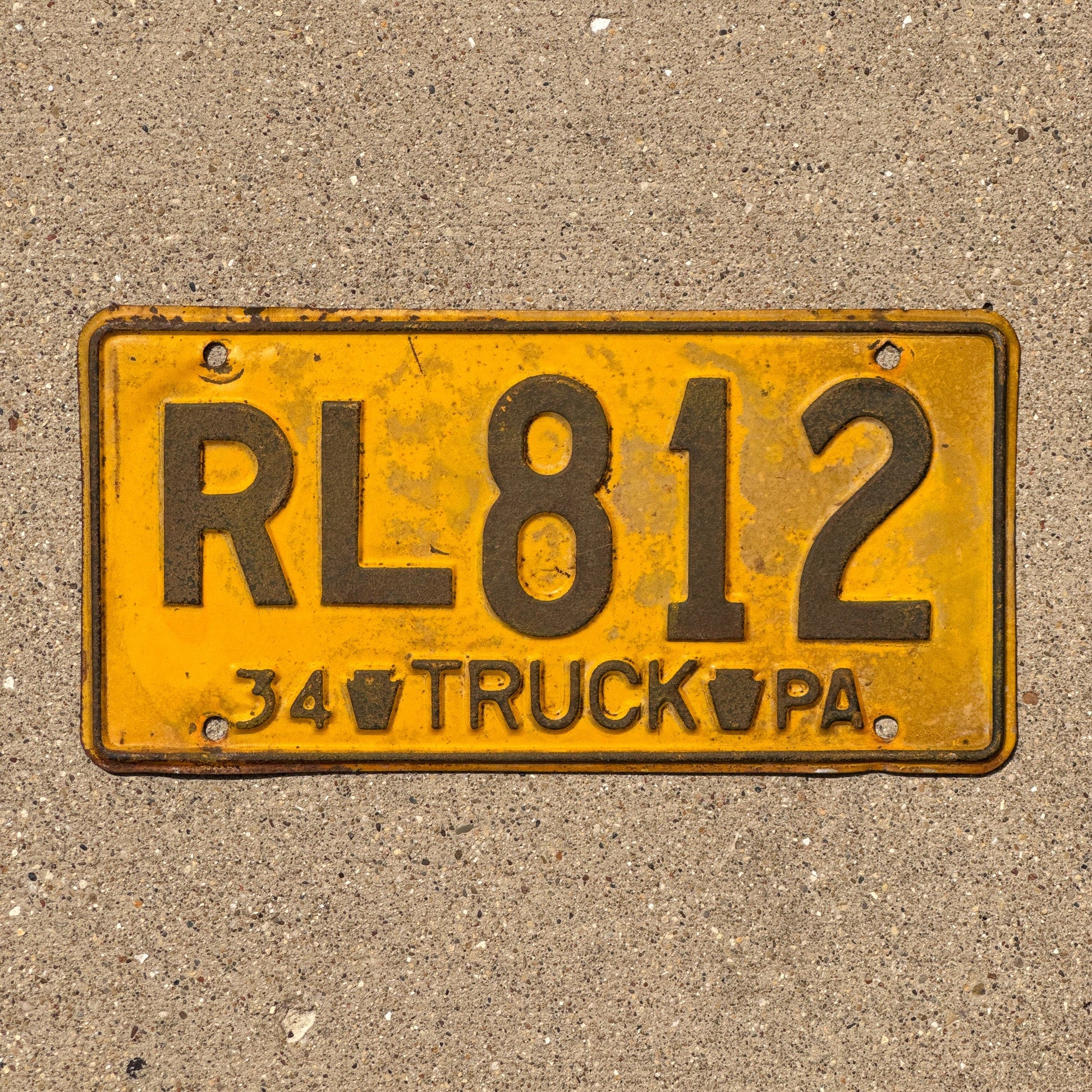 Photo of a 1934 Pennsylvania Truck License Plate Auto Tag Garage Decor Vintage RL 812
