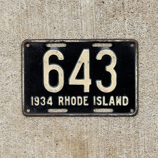 Photo of a 1934 Rhode Island License Plate Auto Tag Garage Decor Vintage Low Number Three Digit 643 with original patina