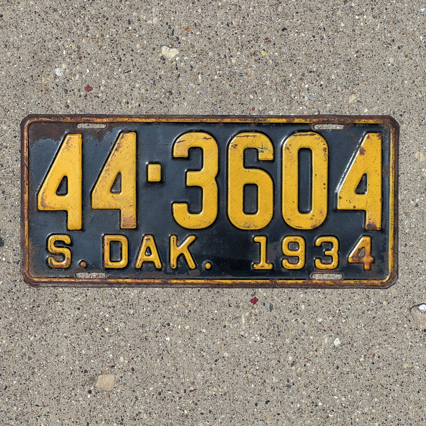 Photo of a 1934 South Dakota License Plate Auto Tag Garage Decor Vintage 44 3604 with original patina