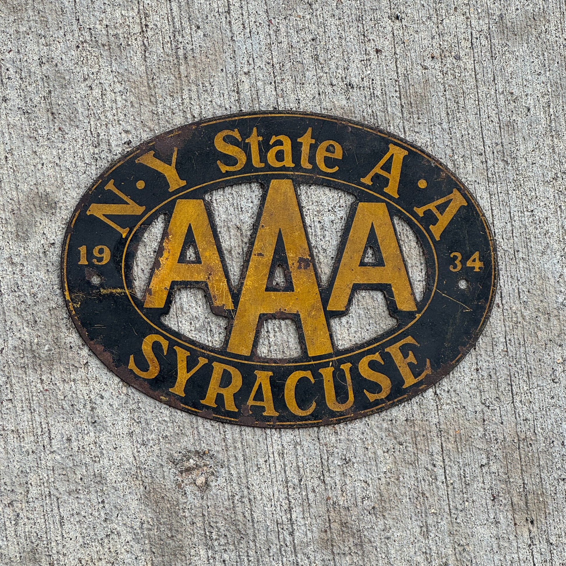 Photo of a 1934 Syracuse New York Badge Emblem License Plate Topper Auto Tag Garage Decor Vintage AAA with original patina