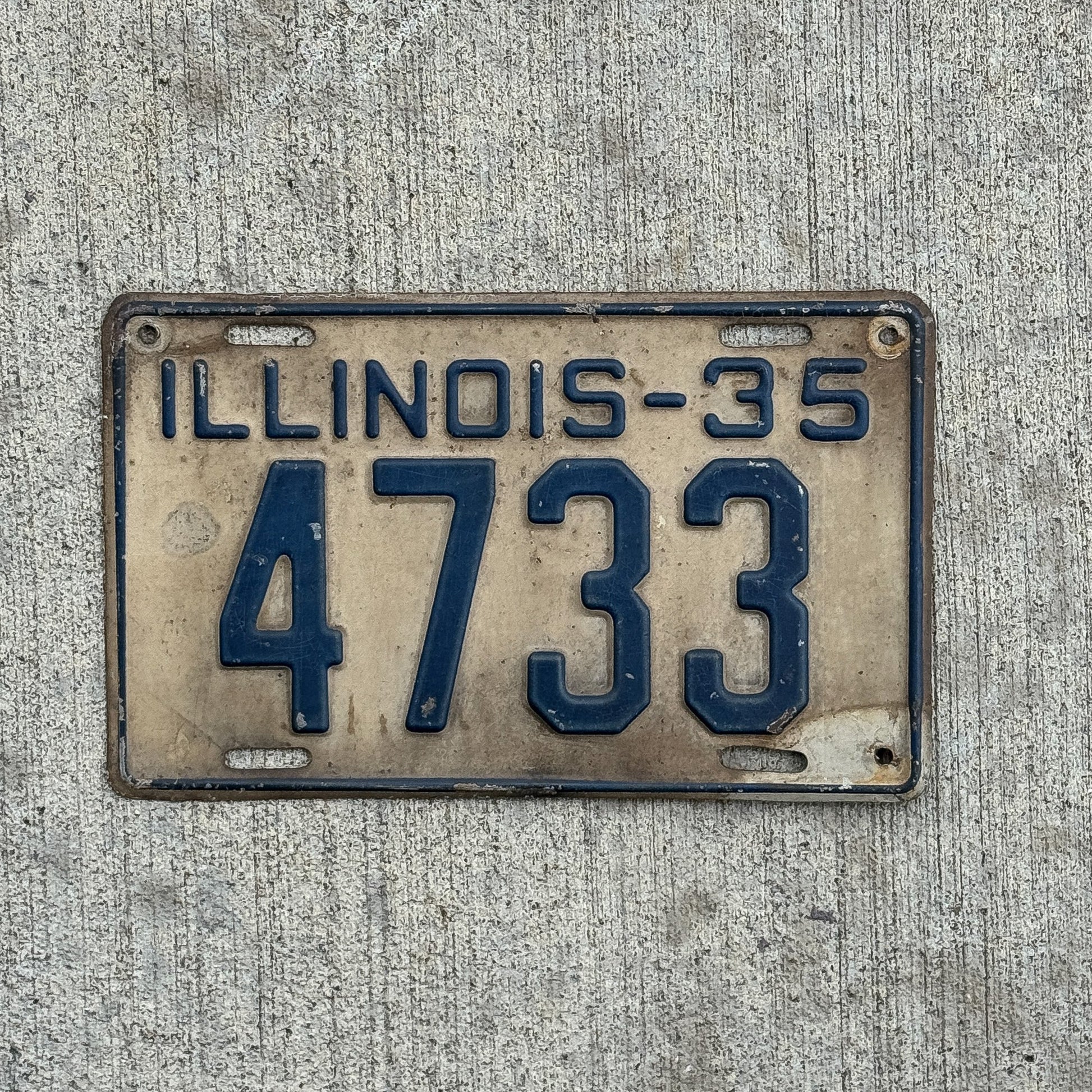 Photo of a 1935 Illinois License Plate Auto Tag Garage Decor Vintage Low Number Four Digit 4733 with original patina