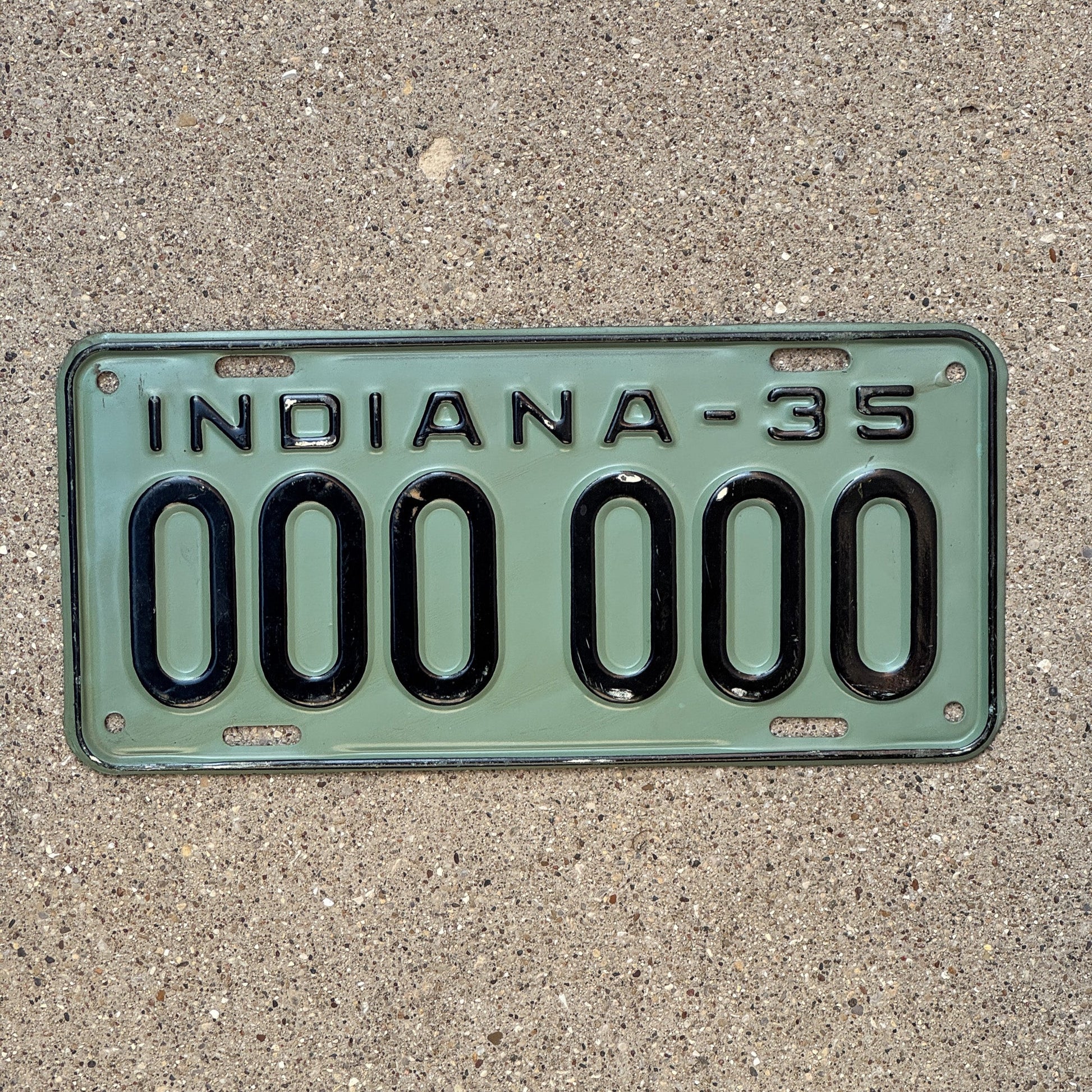 Photo of a 1935 Indiana Sample License Plate Auto Tag Garage Decor Vintage 000 000 with original patina