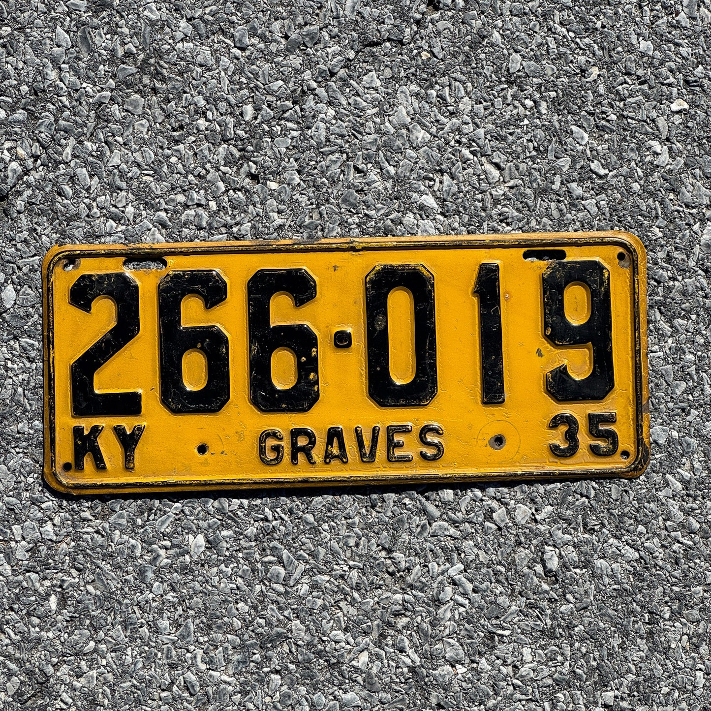 Photo of a 1935 Kentucky License Plate Auto Tag Garage Decor Vintage Graves County 266 019