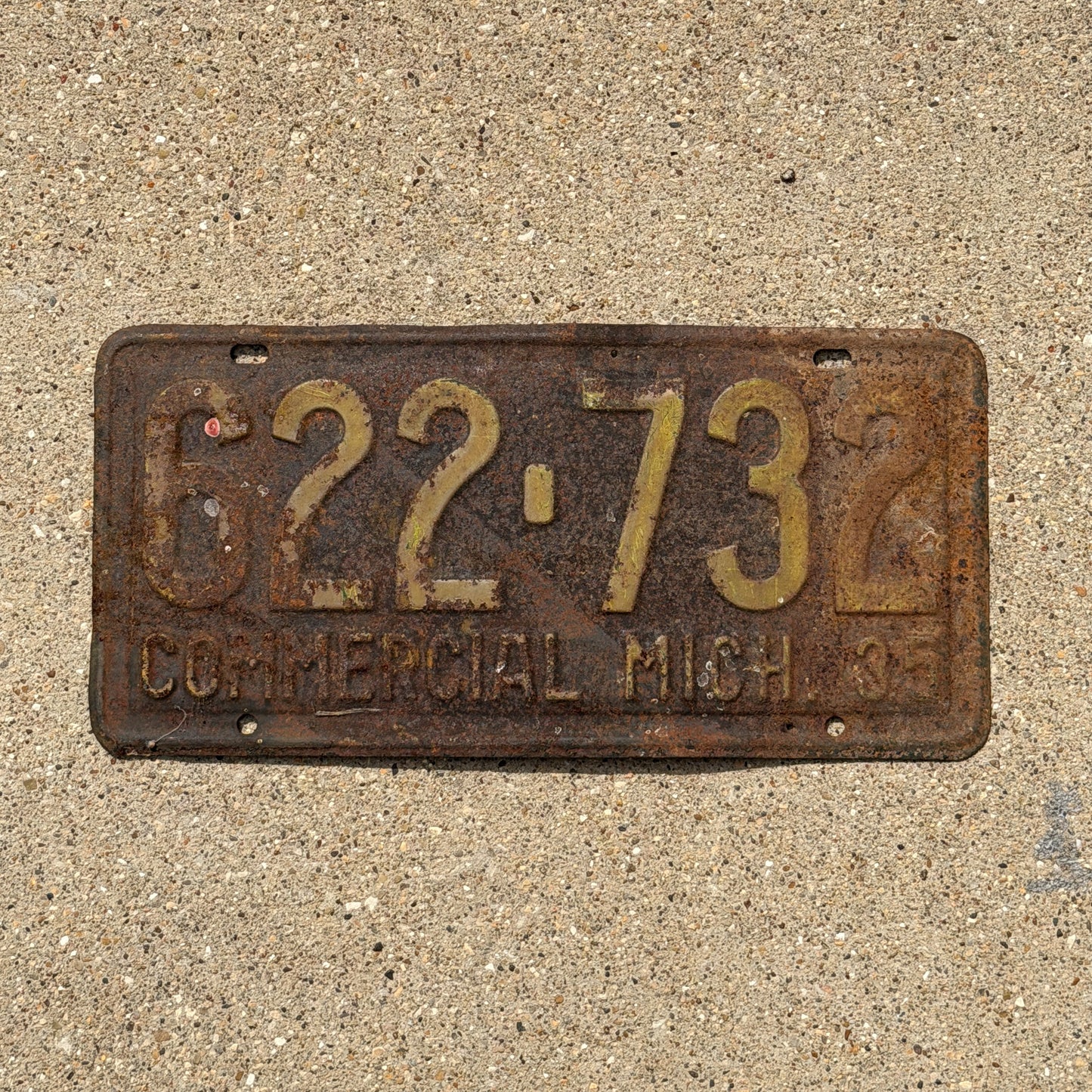 Photo of a 1935 Michigan Commercial License Plate Auto Tag Garage Decor Vintage 622 732 with original patina