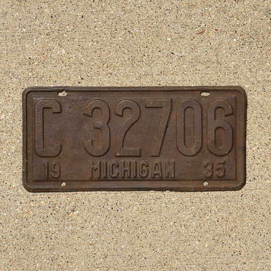 Photo of a 1935 Michigan License Plate Auto Tag Garage Decor Vintage C 32706 with original patina