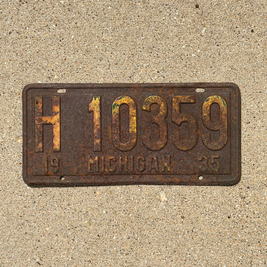 Photo of a 1935 Michigan License Plate Auto Tag Garage Decor Vintage H 10359 with original patina
