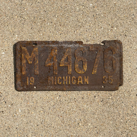 Photo of a 1935 Michigan License Plate Auto Tag Garage Decor Vintage M 44876 with original patina