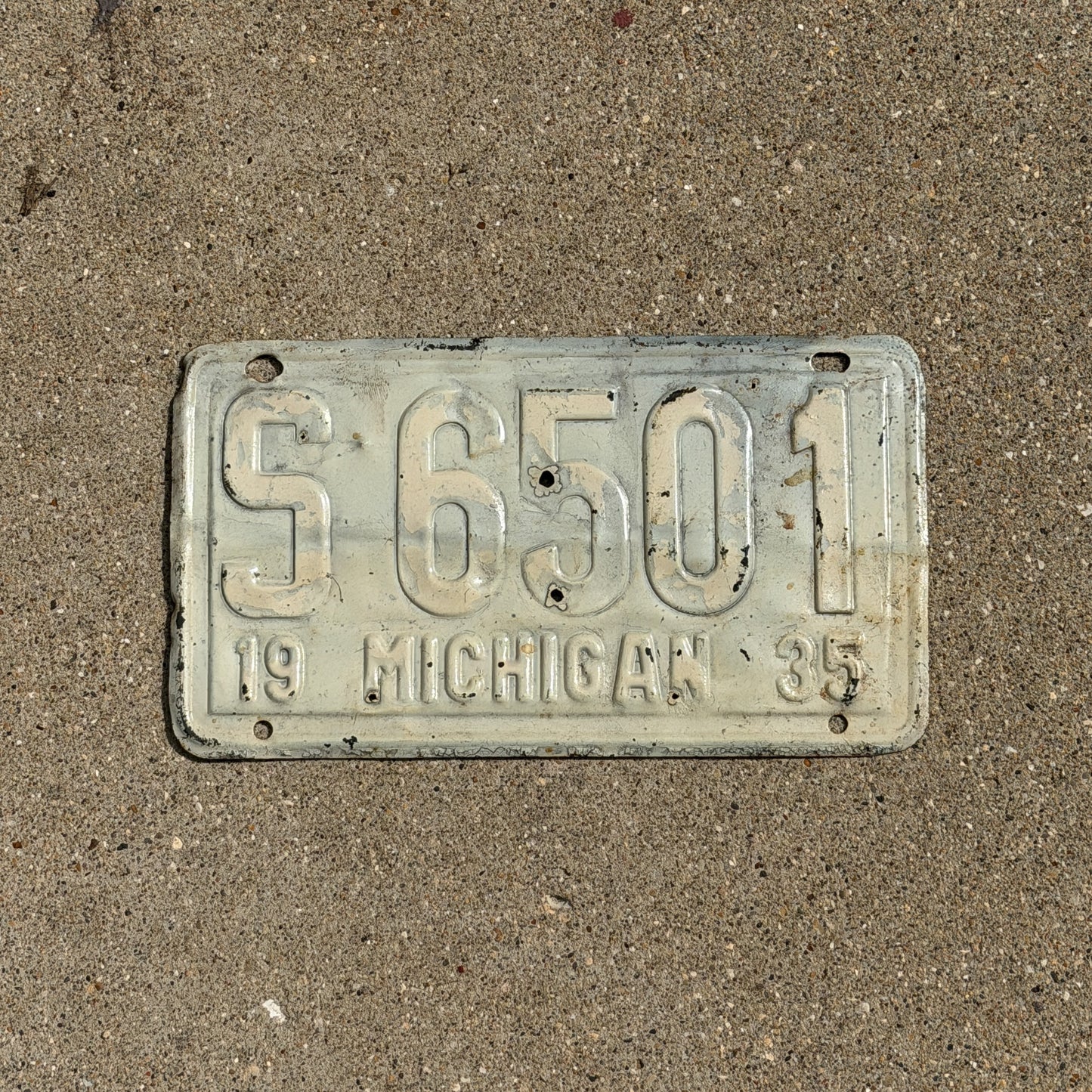 Photo of a 1935 Michigan License Plate Auto Tag Garage Decor Vintage S 6501 with original patina